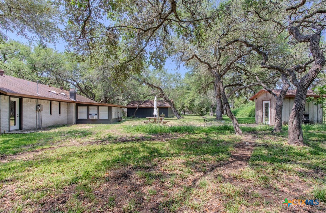 188 Cavalry Road Victoria, TX 77905 - Photo 25 of 30 a view of a house with yard and a tree