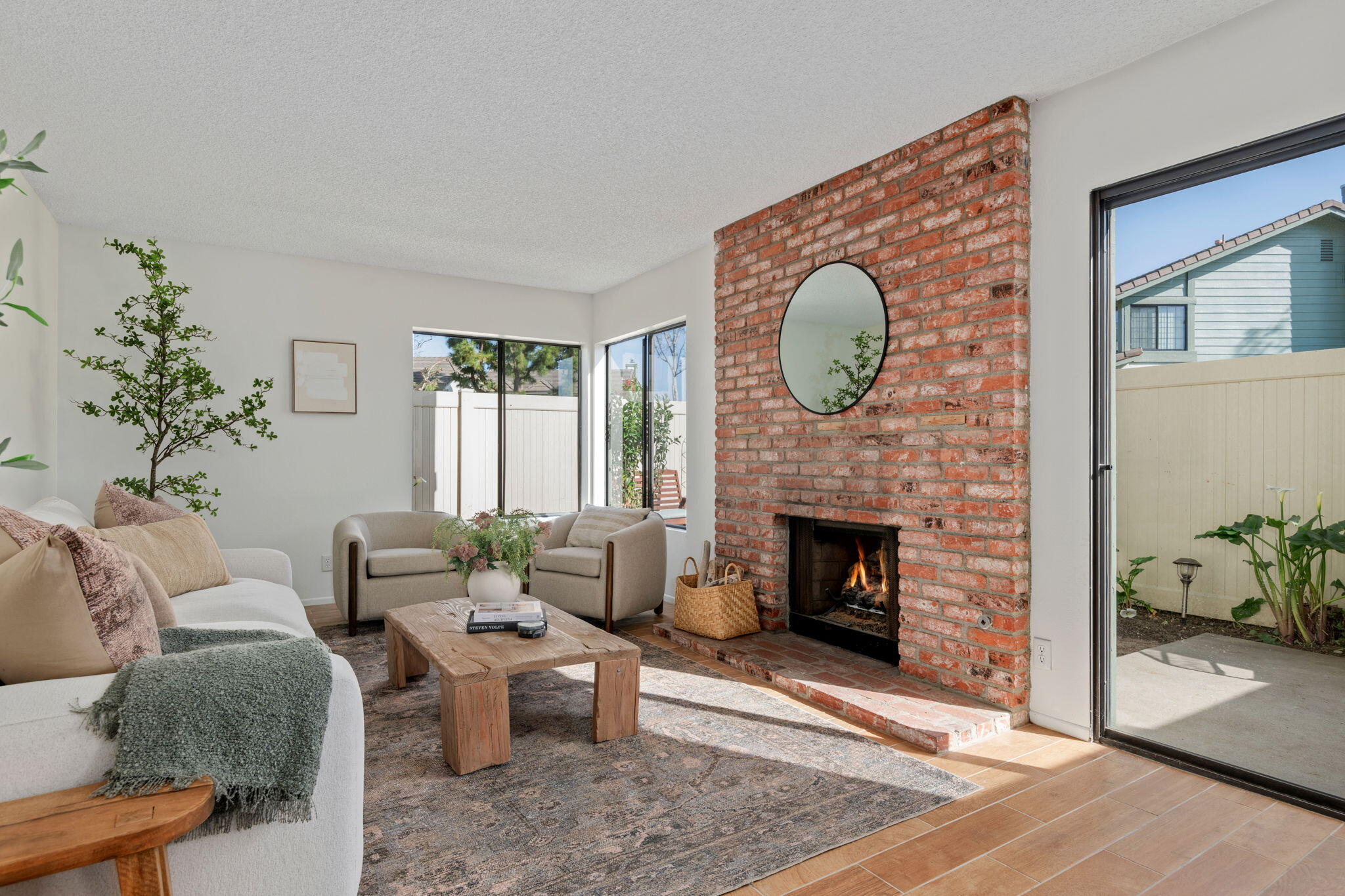 3426 Olds Road Oxnard, CA 93033 - Photo 12 of 30 a living room with furniture and a fireplace