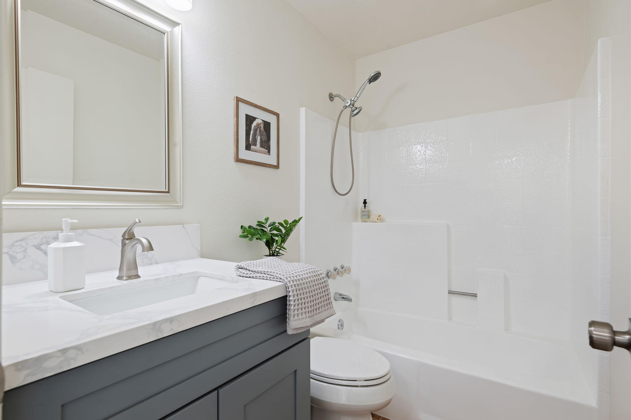 3426 Olds Road Oxnard, CA 93033 - Photo 21 of 30 a bathroom with a sink a toilet and shower