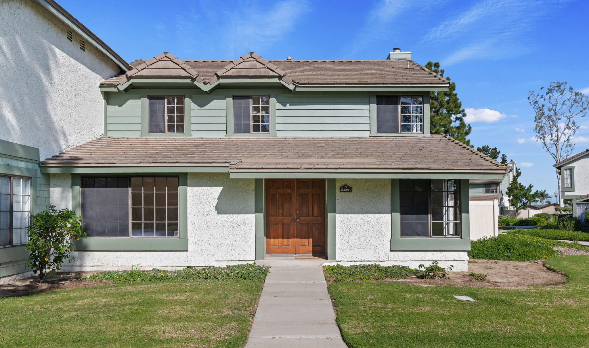 3426 Olds Road Oxnard, CA 93033 - Photo 3 of 30 a front view of a house with a yard
