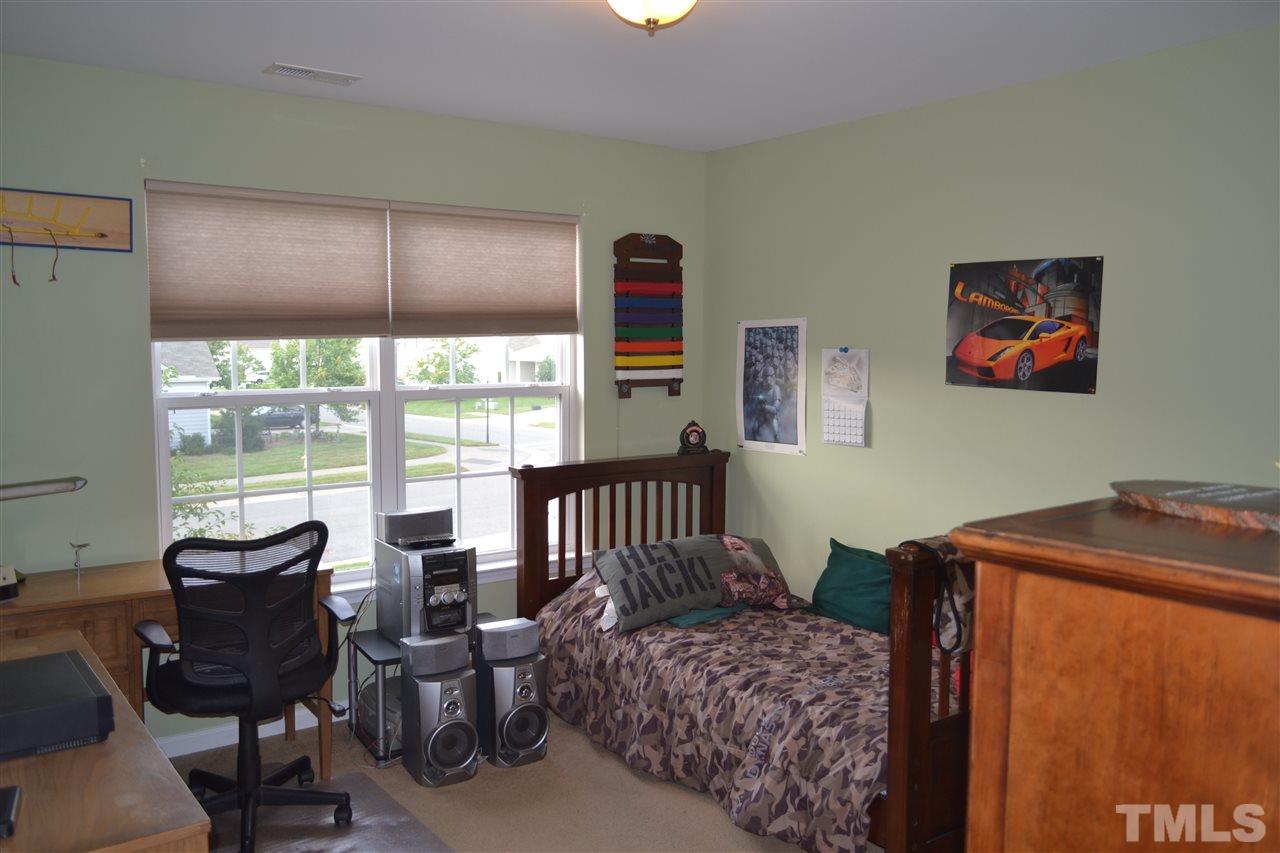 1421 Reynolds Mill Road Wake Forest, NC 27587 - Photo 9 of 18 Large 2nd floor bedroom with nice size closet.