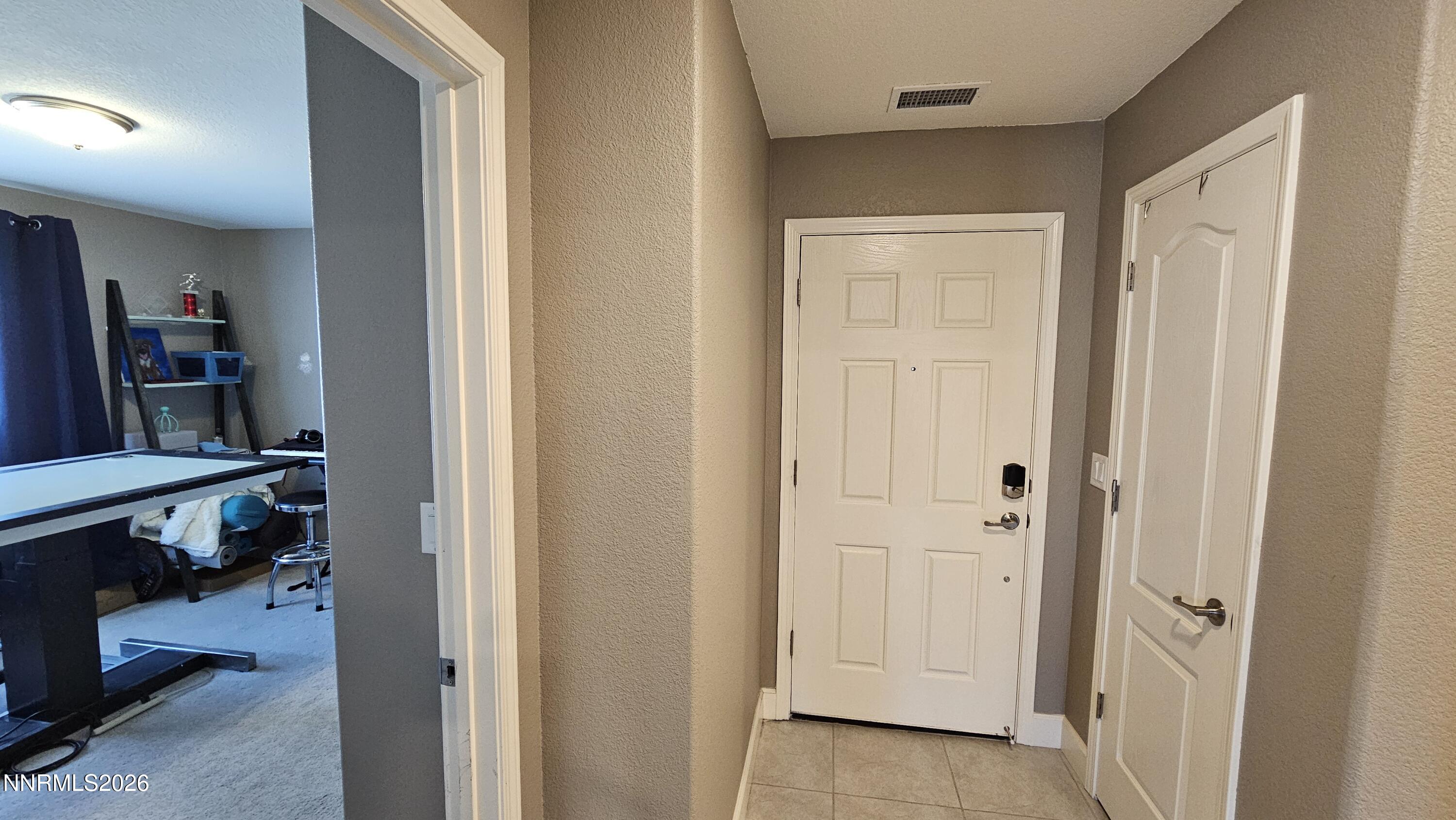 7415 Souverain Lane Reno, NV 89506 - Photo 16 of 23 7415 Souverain Ln - Guest Entryway