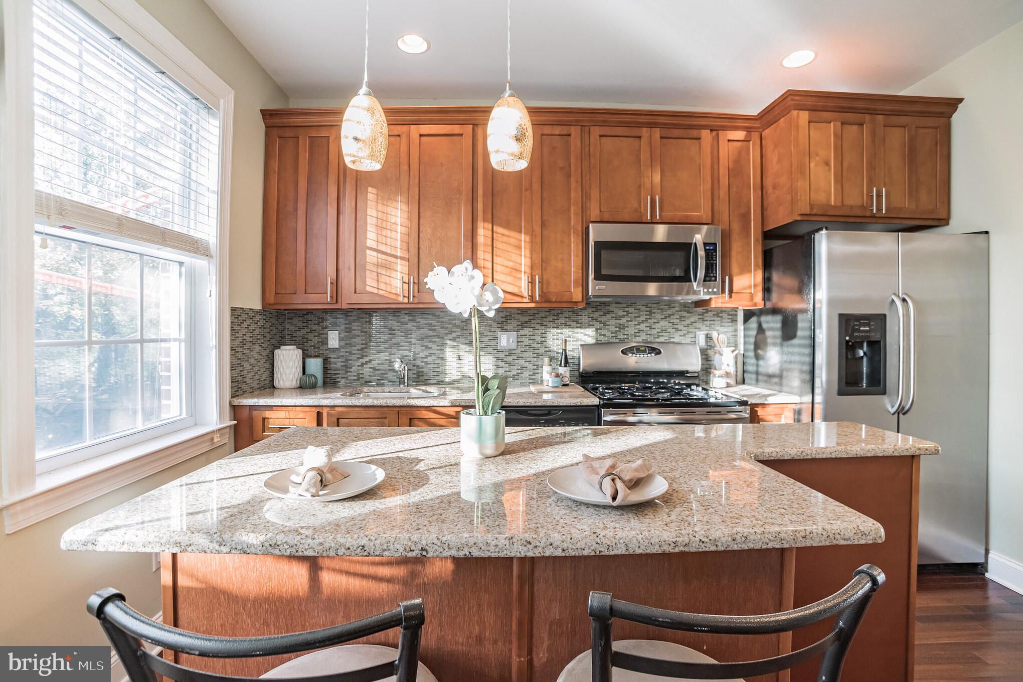 855 North Uber Street, Unit B Philadelphia, PA 19130 - Photo 6 of 36 bright and sunny kitchen off of LR/DR