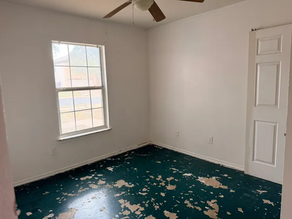 an empty room with a window