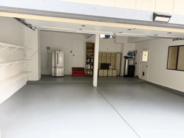 a view of a livingroom with furniture and closet