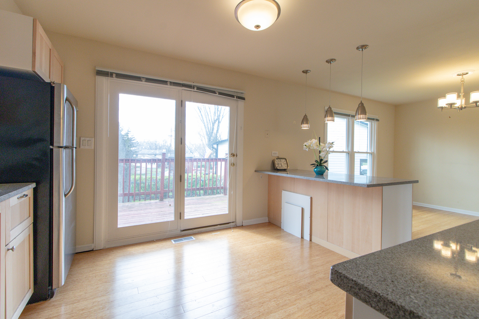 825 Freeman Road Hoffman Estates, IL 60192 - Photo 11 of 30 a view of a kitchen with a sink and a large window