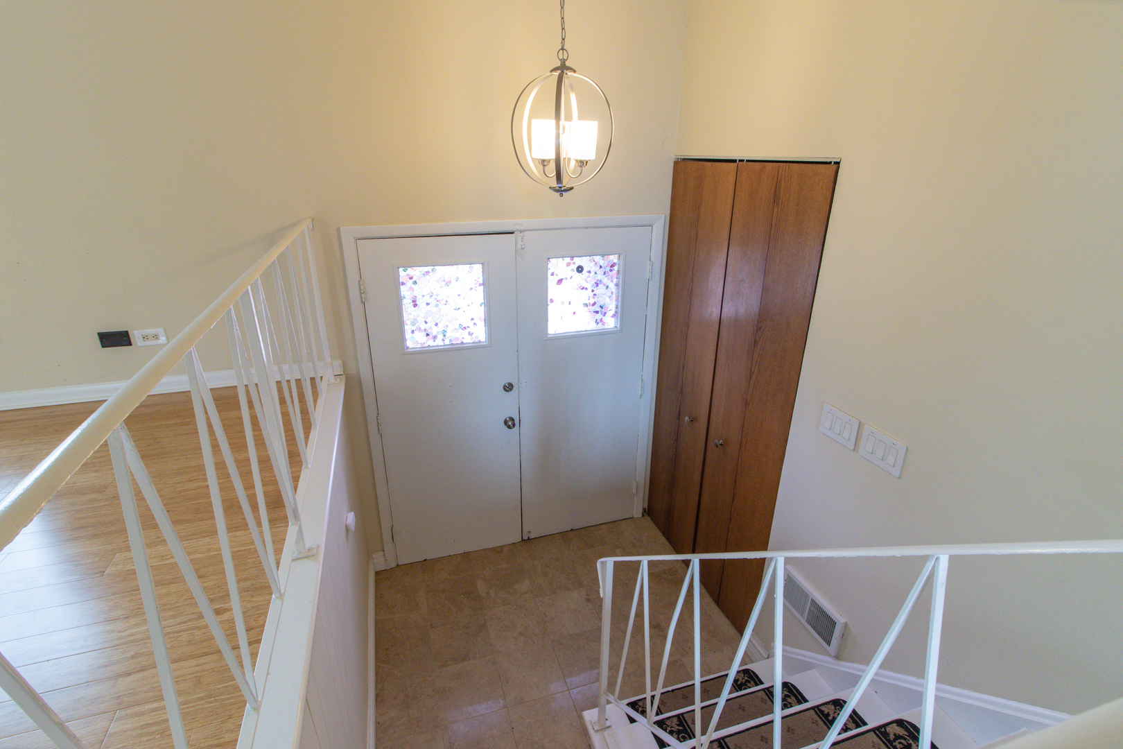 825 Freeman Road Hoffman Estates, IL 60192 - Photo 3 of 30 a view of entryway with wooden floor