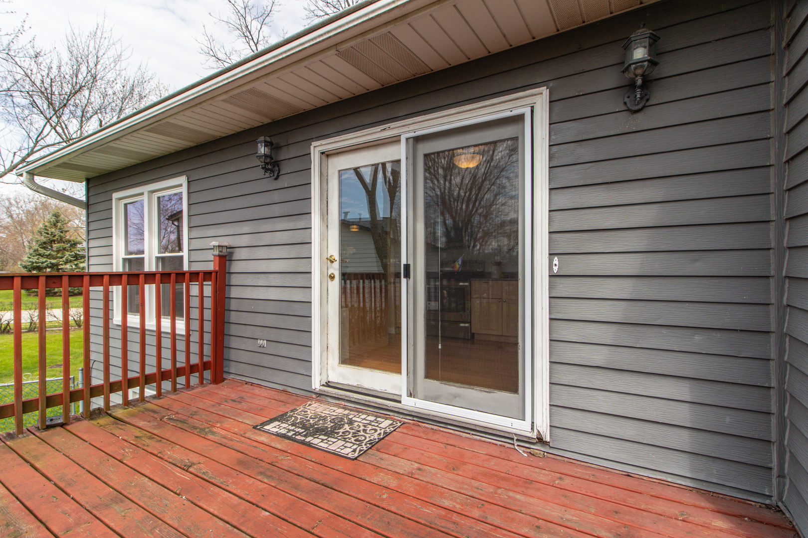 825 Freeman Road Hoffman Estates, IL 60192 - Photo 25 of 30 a view of backyard with wooden deck
