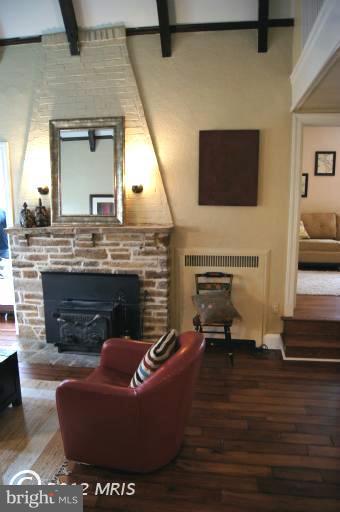 719 Anneslie Road Baltimore, MD 21212 - Photo 8 of 30 Stone fireplace with wood stove insert