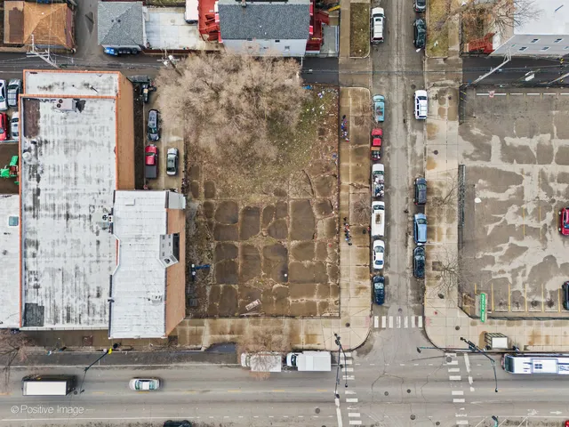 an aerial view of a house with a outdoor space