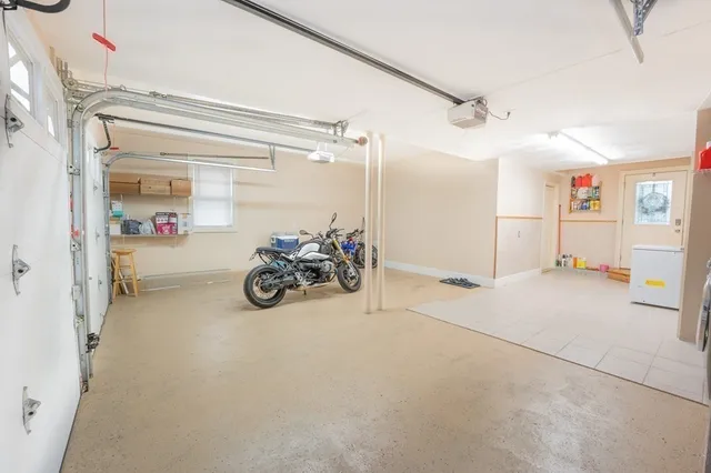 a view of a livingroom with furniture and a ceiling fan
