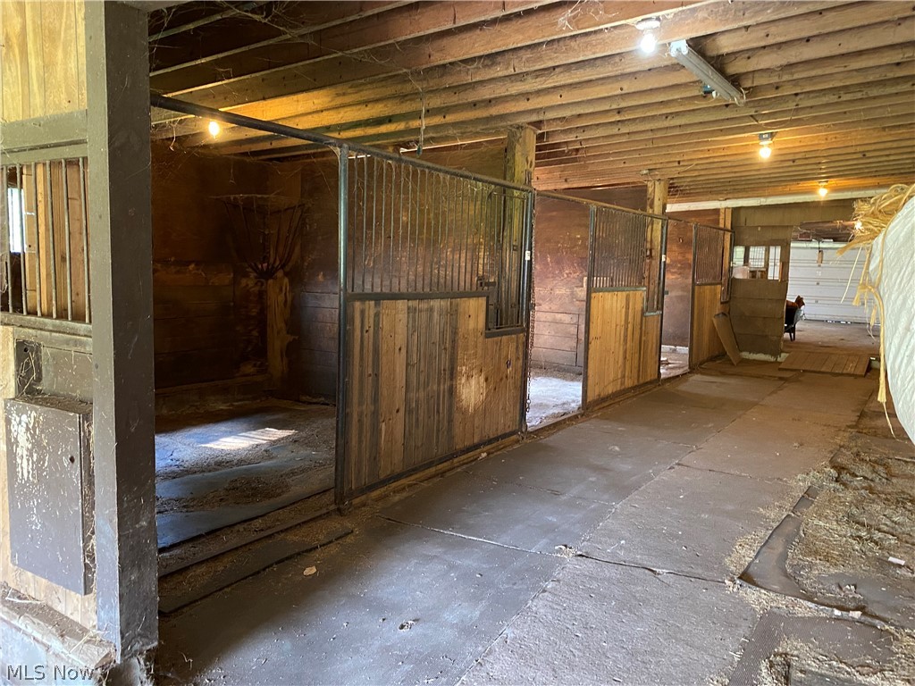7706 Sanborn Road Ashtabula, OH 44004 - Photo 28 of 35 12-stall horse barn with water, 1/2 concrete floor w/ pads, 1/2 dirt floor.