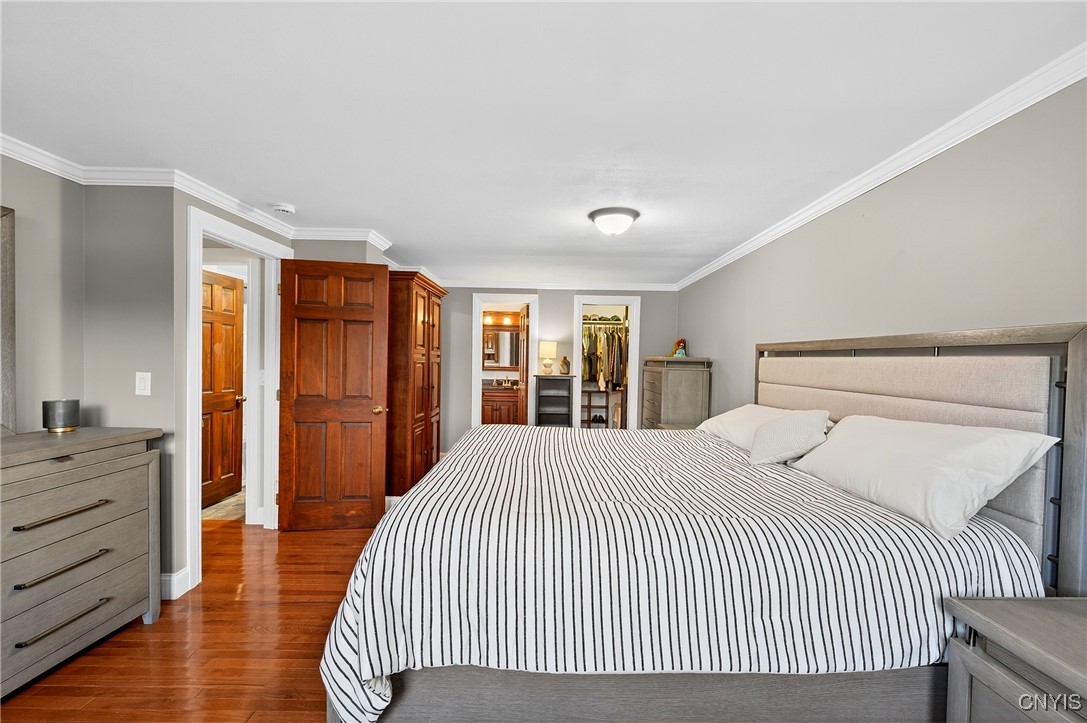 7949 Boxford Road Clay, NY 13041 - Photo 26 of 50 Primary suite with built in armoire, walkin closet