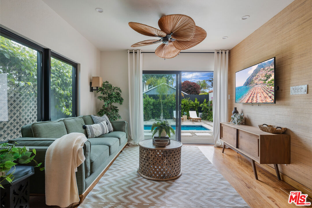 3004 Yale Avenue Marina del Rey, CA 90292 - Photo 17 of 42 a living room with furniture potted plant and a large window