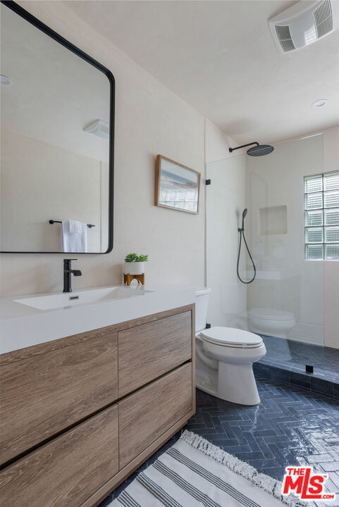 3004 Yale Avenue Marina del Rey, CA 90292 - Photo 25 of 42 a bathroom with a white toilet sink and shower