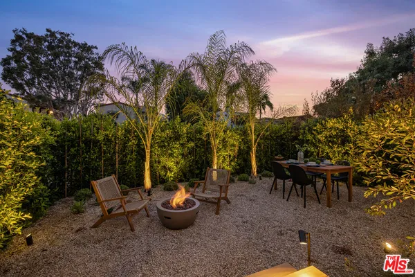 a view of a tables and chairs in the patio