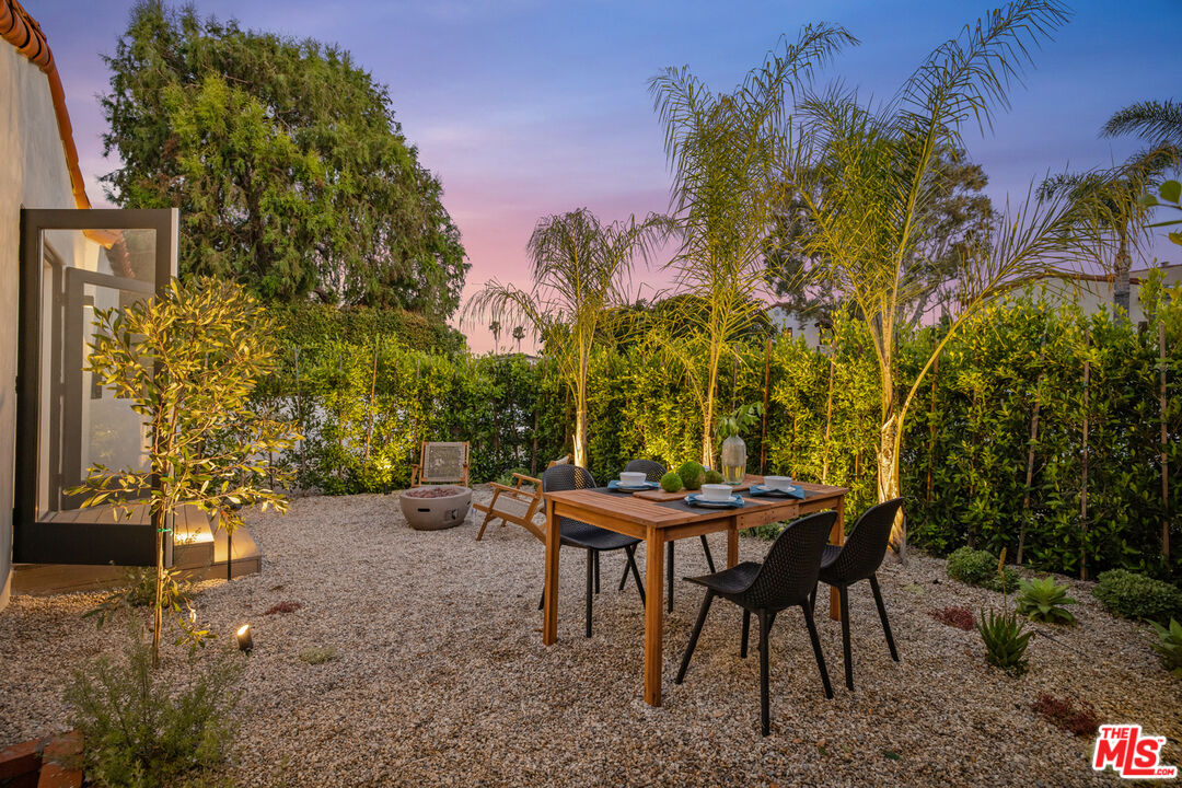 3004 Yale Avenue Marina del Rey, CA 90292 - Photo 4 of 42 a view of a backyard with table and chairs and potted plants