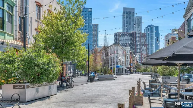 a view of dinning table and chairs in patio