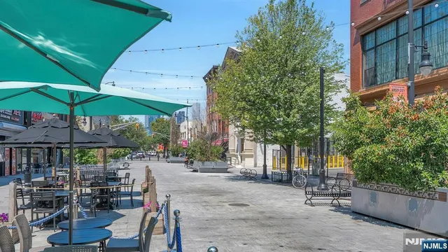 a view of street with sitting area