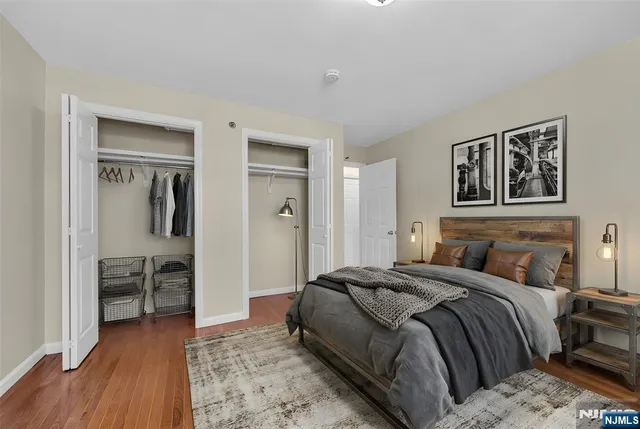 a bedroom with a bed and a view of bathroom