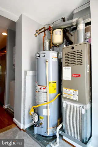 a view of kitchen and dining room with wooden floor