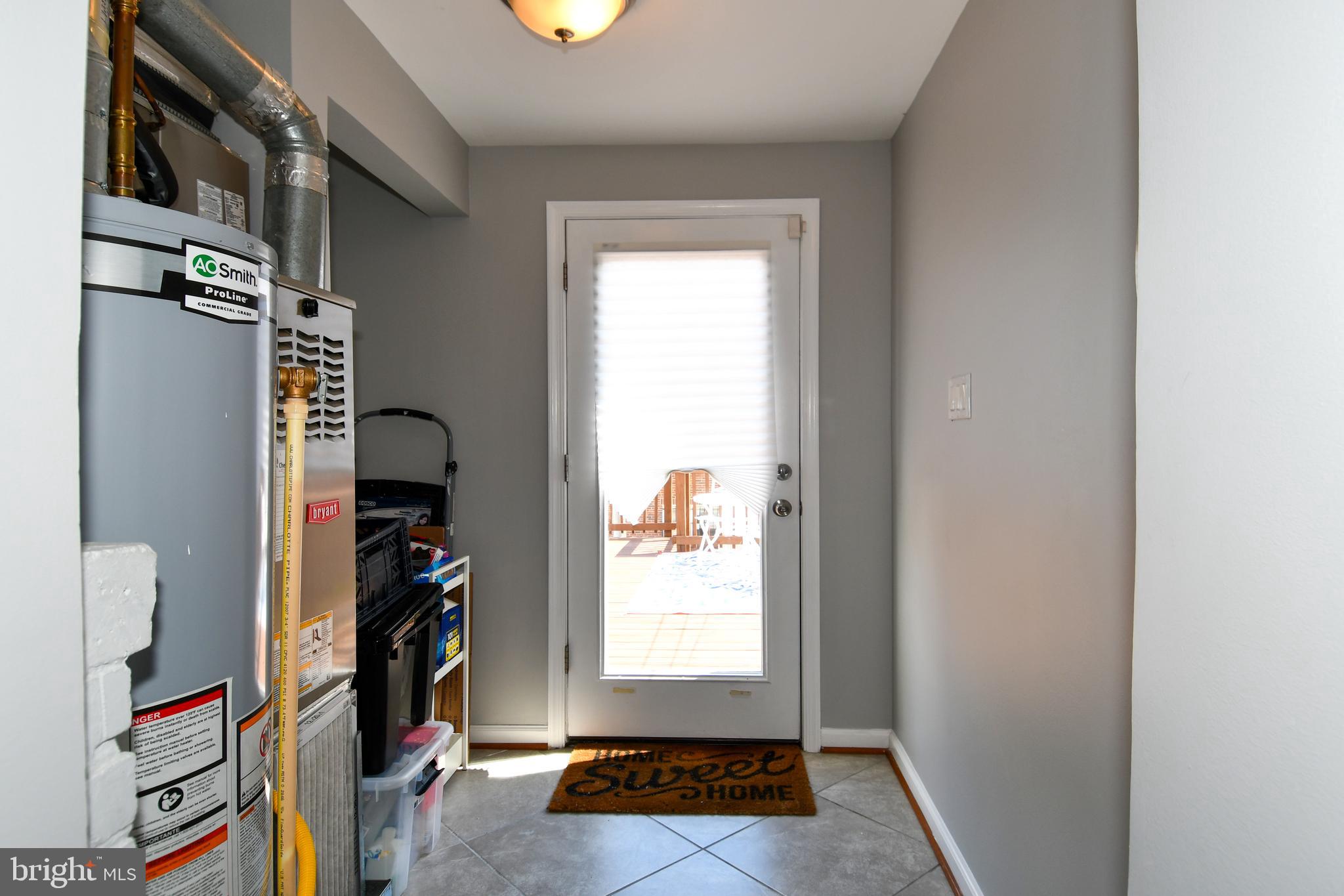 1643 Montello Avenue Northeast, Unit 4 Washington, DC 20002 - Photo 21 of 30 a view of walk in closet with clothes and shoes