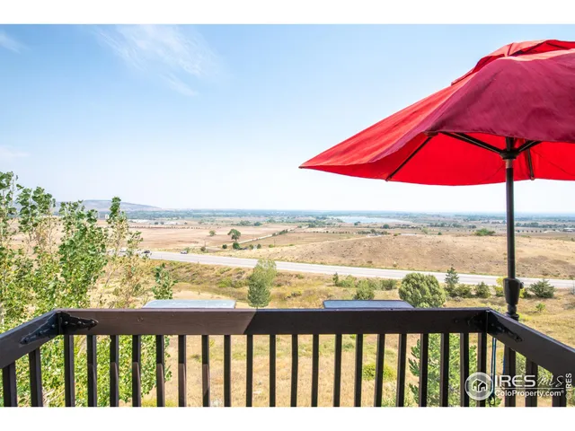 a view of swimming pool with seating area