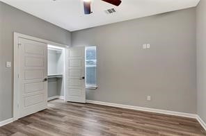 6814 Dumble Street, Unit B Houston, TX 77021 - Photo 16 of 22 wooden floor in an empty room