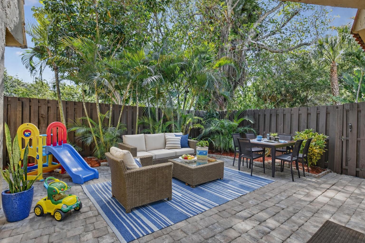 22958 Oxford Place, Unit D Boca Raton, FL 33433 - Photo 9 of 54 Family-friendly patio with play area