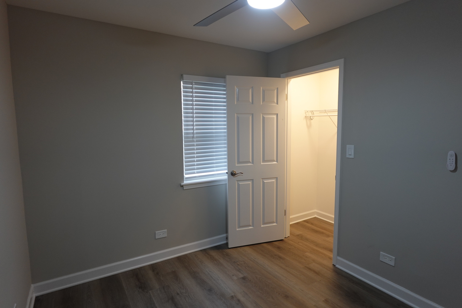 613 South Oltendorf Road Streamwood, IL 60107 - Photo 15 of 37 an empty room with wooden floor and windows