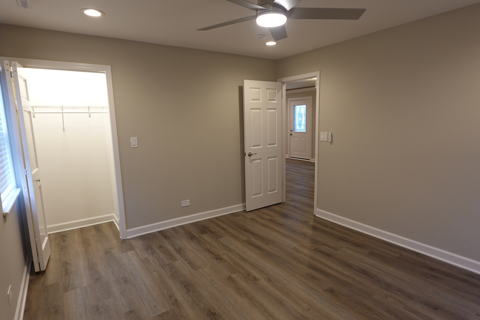 613 South Oltendorf Road Streamwood, IL 60107 - Photo 21 of 37 an empty room with wooden floor and closet