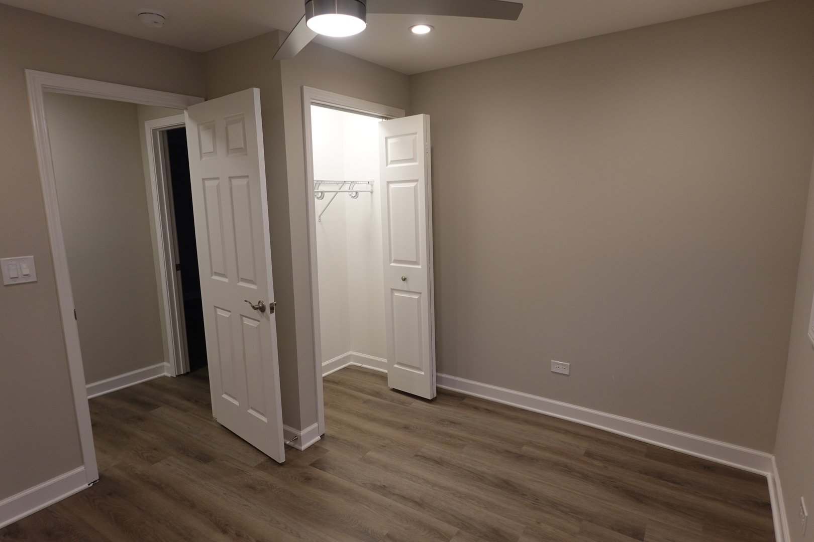 613 South Oltendorf Road Streamwood, IL 60107 - Photo 27 of 37 an empty room with wooden floor and closet