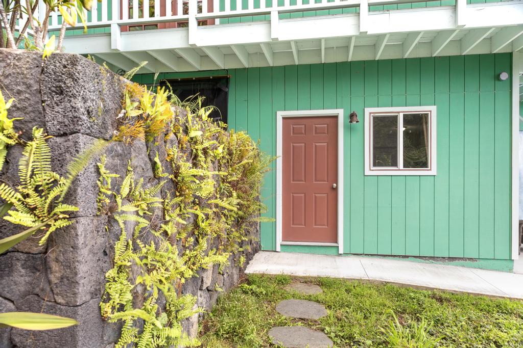 87-2707 Hawaii Belt Road Captain Cook, HI 96704 - Photo 23 of 30 a front view of a house with a yard