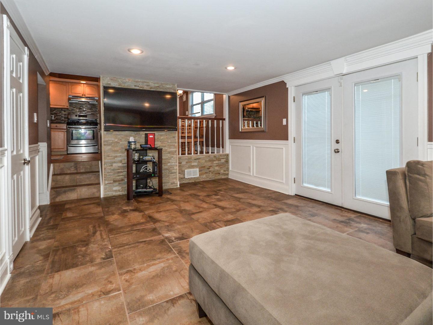 9734 Beacon Road Philadelphia, PA 19115 - Photo 15 of 25 a view of livingroom with hardwood floor and ceiling fan
