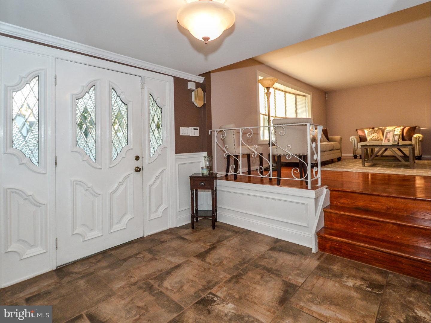 9734 Beacon Road Philadelphia, PA 19115 - Photo 4 of 25 a living room with furniture and wooden floor