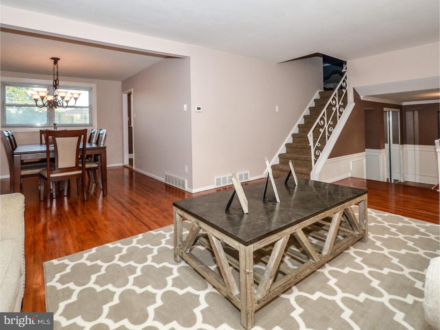 9734 Beacon Road Philadelphia, PA 19115 - Photo 5 of 25 a living room with furniture and wooden floor