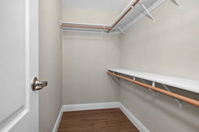 a view of a room with racks on the wall