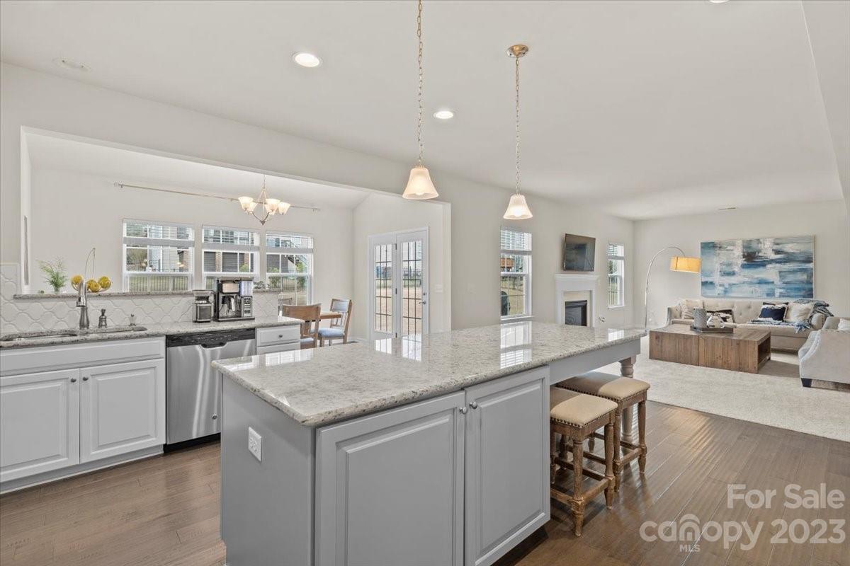 1662 Callahan Road Fort Mill, SC 29715 - Photo 15 of 42 a large kitchen with granite countertop a lot of counter space and a sink