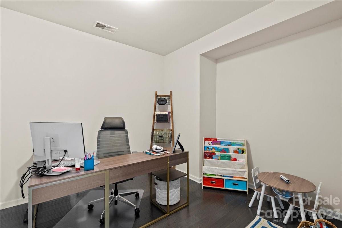 1662 Callahan Road Fort Mill, SC 29715 - Photo 20 of 42 a room with furniture a desk and chair
