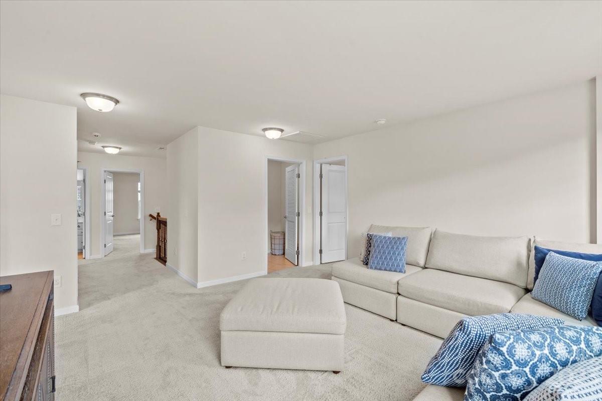 1662 Callahan Road Fort Mill, SC 29715 - Photo 24 of 42 a living room with furniture and a couch