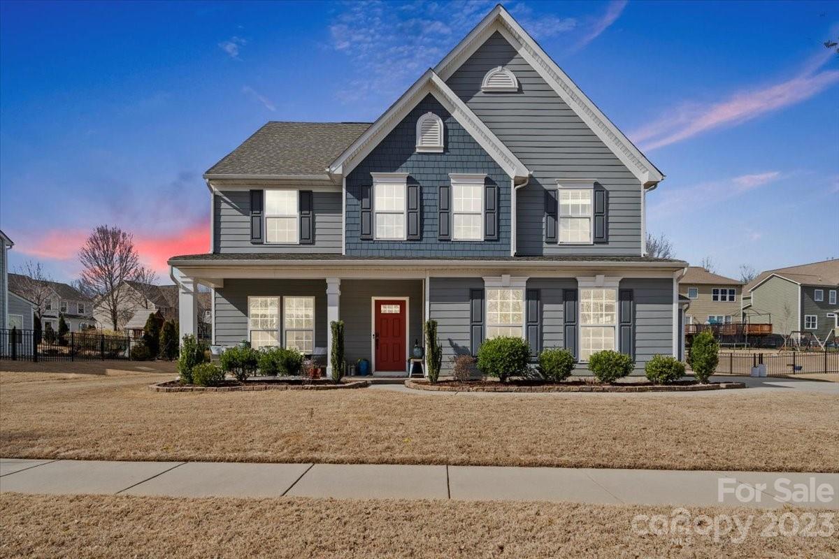 1662 Callahan Road Fort Mill, SC 29715 - Photo 3 of 42 a front view of a house with a yard