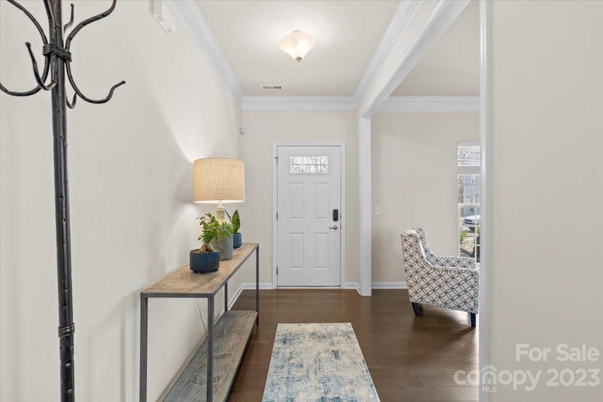1662 Callahan Road Fort Mill, SC 29715 - Photo 6 of 42 a living room with furniture and a potted plant