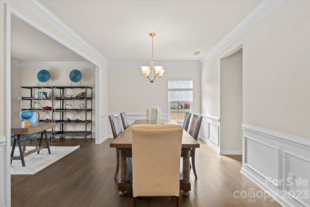 1662 Callahan Road Fort Mill, SC 29715 - Photo 9 of 42 a dining room with furniture and wooden floor