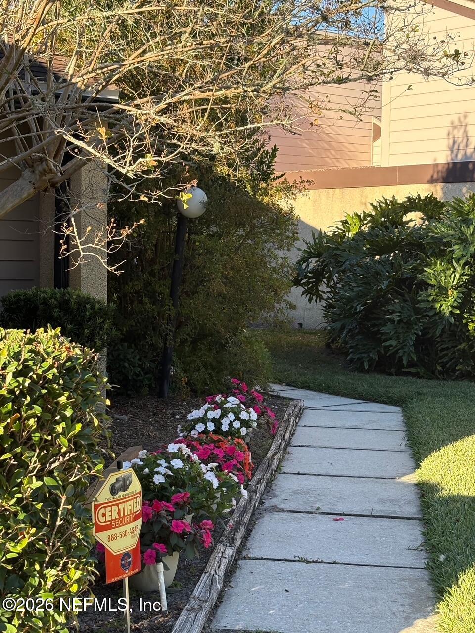 a view of a street with an outdoor space