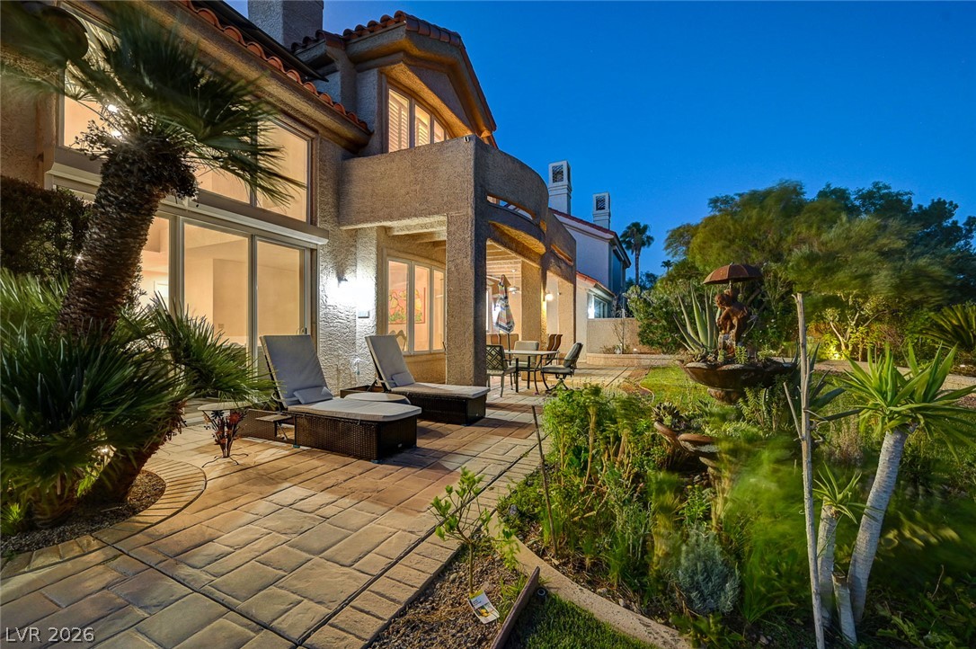 7995 Rio Rico Drive Las Vegas, NV 89113 - Photo 70 of 92 An inviting backyard oasis offers ample entertaining space and lush landscaping.