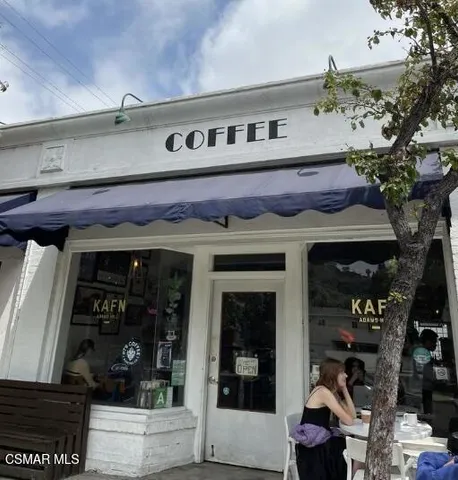 a view of a house with a garden