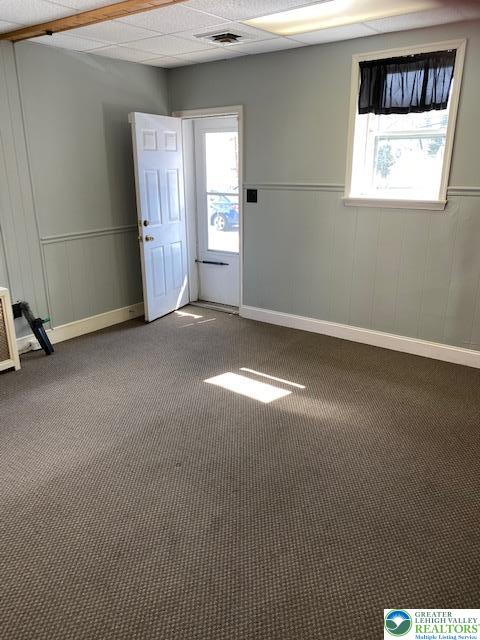 326 Main Street, Unit 1 Emmaus, PA 18049 - Photo 4 of 5 an empty room with windows