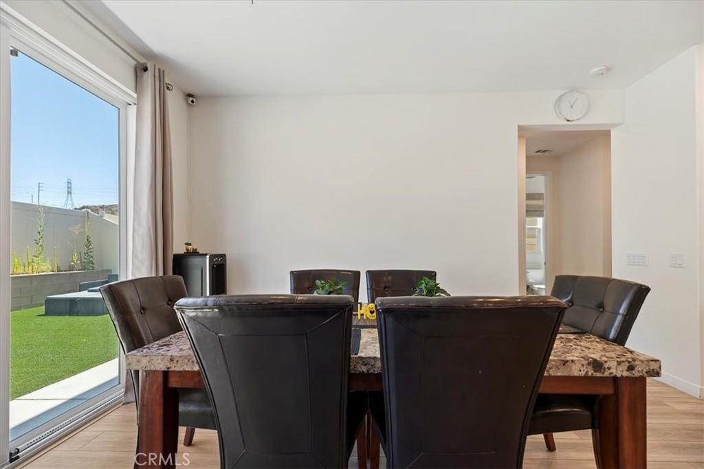 20911 Jennings Way Newhall, CA 91321 - Photo 17 of 47 a view of a dining room with furniture and window