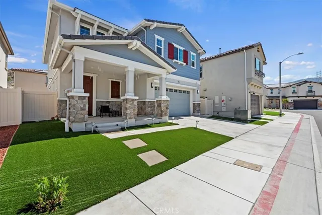 a house view with a outdoor space