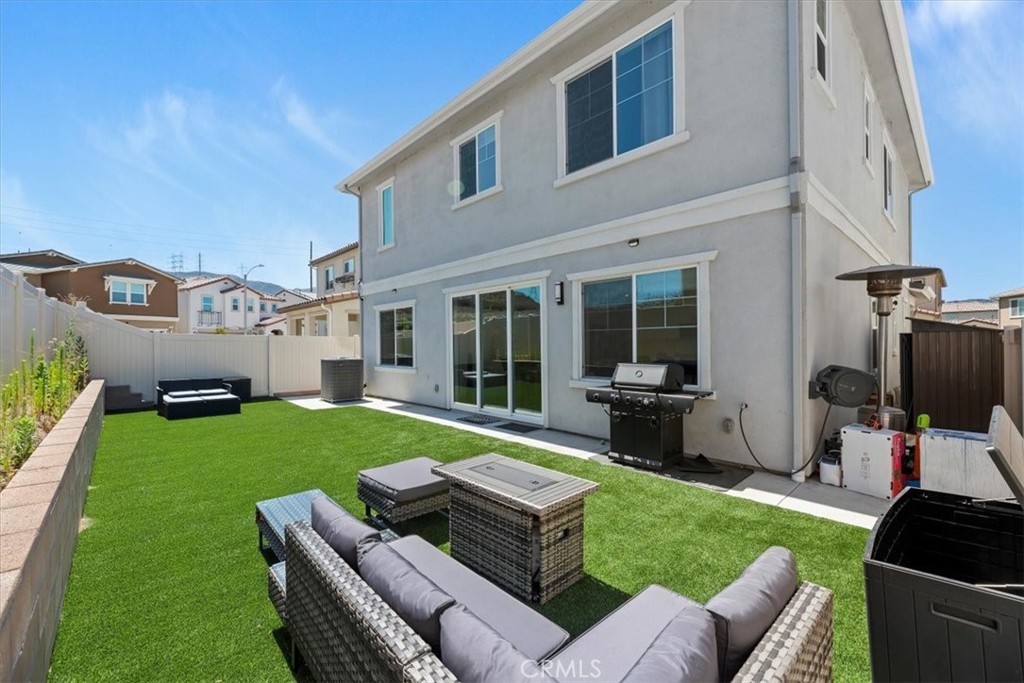 20911 Jennings Way Newhall, CA 91321 - Photo 42 of 47 a view of a house and a back yard